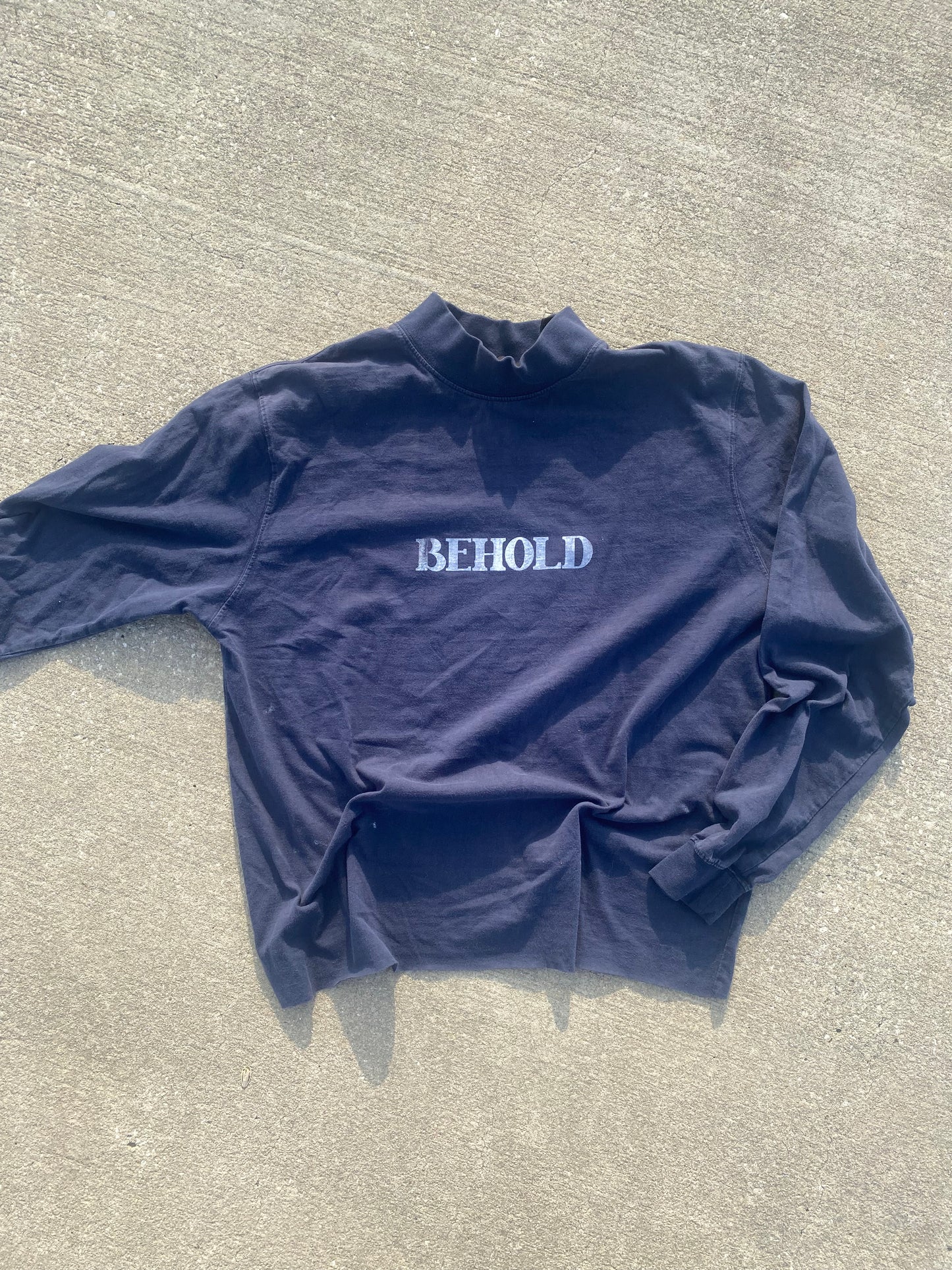 Navy “face of Jesus” turtle neck
